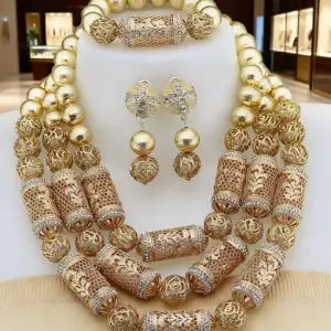 Gold-colored African wedding jewelry set: copper necklace, bracelet, earrings